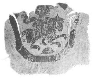 Monochrome tapestry roundel with horseman