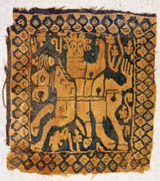Monochrome tapestry square with a horseman within a geometric lattice frame