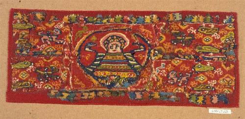 Polychrome tapestry band with a central medallion containing a nimbed bust flanked by a double band of lattice containing animal and plant motifs