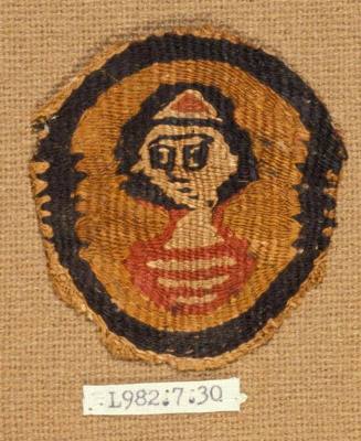 Polychrome tapestry roundel containing a male bust