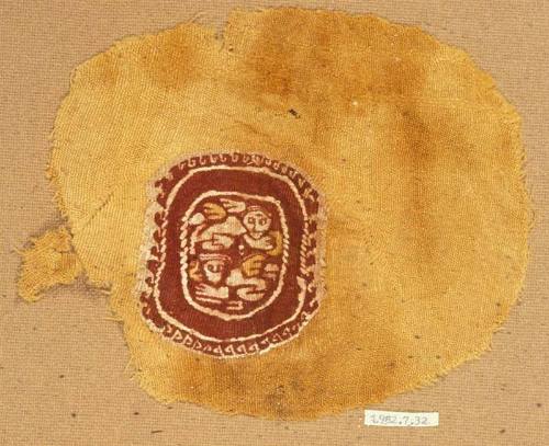 Mainly monochrome tapestry roundel with swimming putti