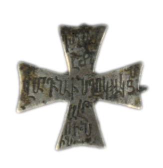 Cross with hooks for attachment