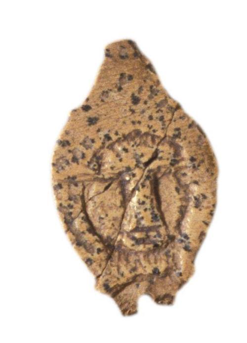 Amulet or doll
