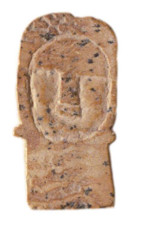 Amulet or doll