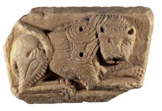 Relief sculpture, crouching lion