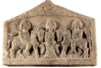 Relief of goddess flanked by Dioskuroi