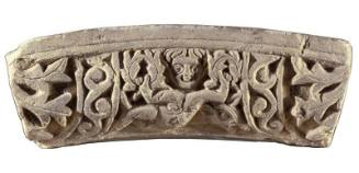 Architectural relief/segment of an arch/figure holding two wreaths