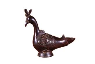 Lamp in the form of a peacock