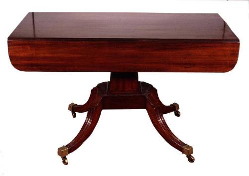 Drop leaf pedestal table
