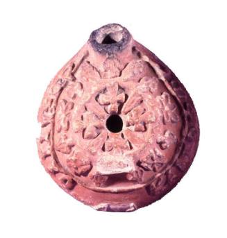 Lamp with relief decoration on body