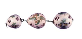 Three hanging ceramic eggs