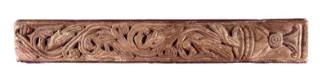 Fragmentary pillar with relief carving