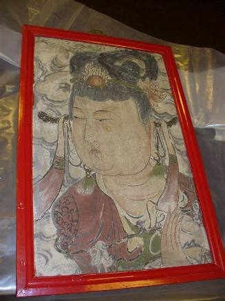 Buddhist tomb fragment of face of female attendant