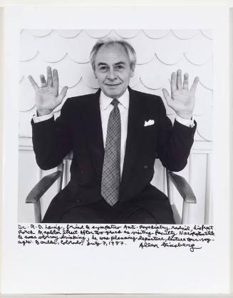 R.D. Laing portrait, front porch Boulder, hands up