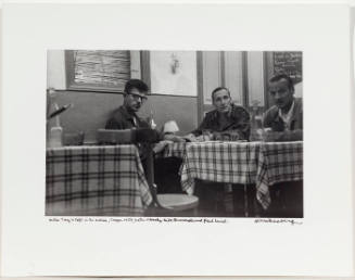 Peter Orlovsky, William Burroughs, and Paul Lund eating at Dutch Tony's Restaurant