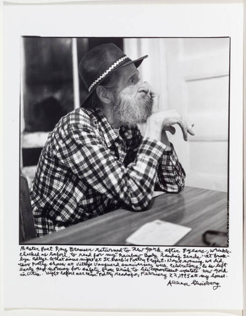 Ray Bremser in plaid shirt and hat in Allen's kitchen: variation 5 (limp wrist)