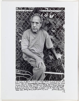 Robert Frank portrait sitting on a bicycle