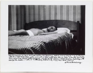 William Burroughs 206 E 7th street, reclining on bed