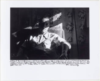 William Burroughs, sitting in arm chair, dramatic contrast in light, NY September