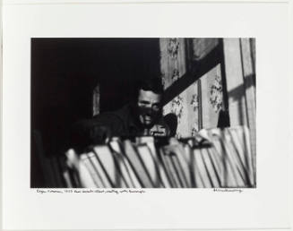 Jack Kerouac looking out the window apartment 206 E 7th street
