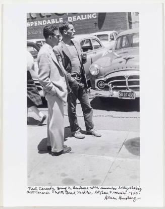 Neal Cassady with car salesman, used car lot, San Francisco