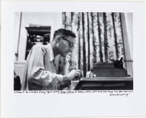 William Burroughs at typewriting fixing Yage letters typescript, 206 East 7th Street New York, Fall
