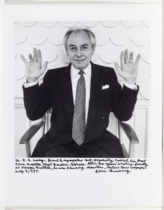 R.D. Laing portrait, front porch Boulder, hands up