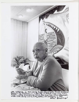 Lita Hornick in front of Richard Bosman painting