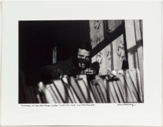 Jack Kerouac looking out the window apartment 206 E 7th street