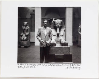 William Burroughs in front of sphinx at the Metropolitan Museum of Art, NYC