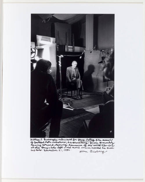 William Burroughs, James Grauerholz in silhouette - interviewed on film set